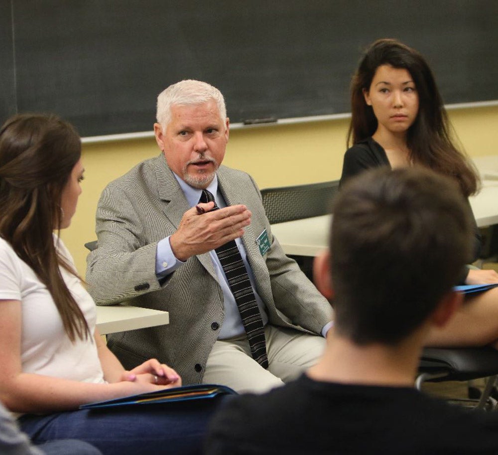 Terry Hunt with students Terry Hunt with students