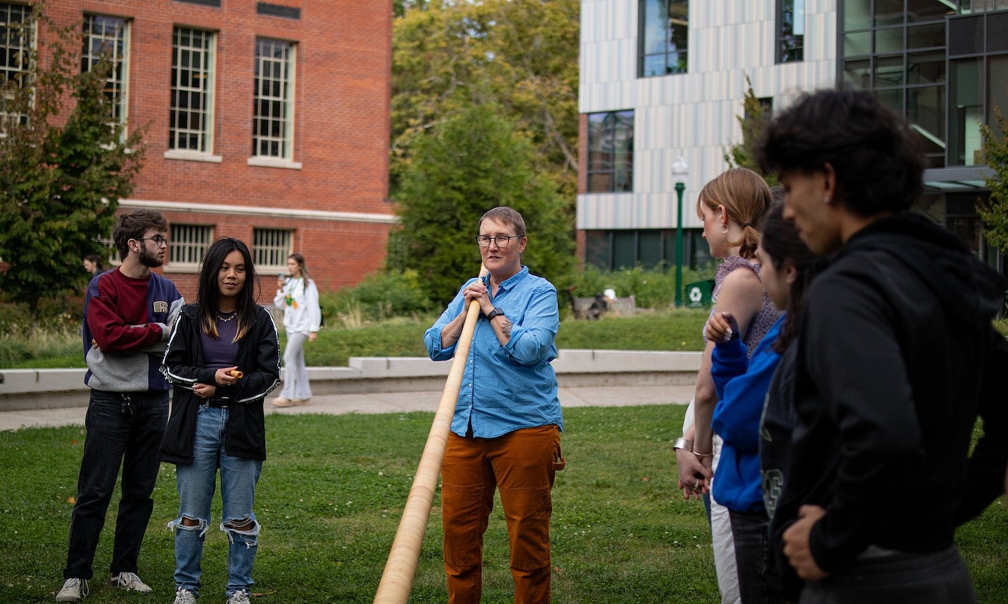 lydia van dreel teaching class on tykeson lawn with alpenhorn