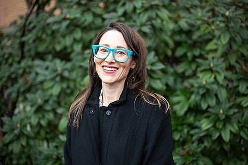 professor hannah cutting-jones portrait with leafy background