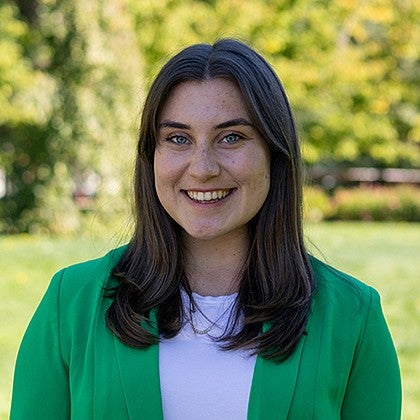 headshot of student chloe webster outside