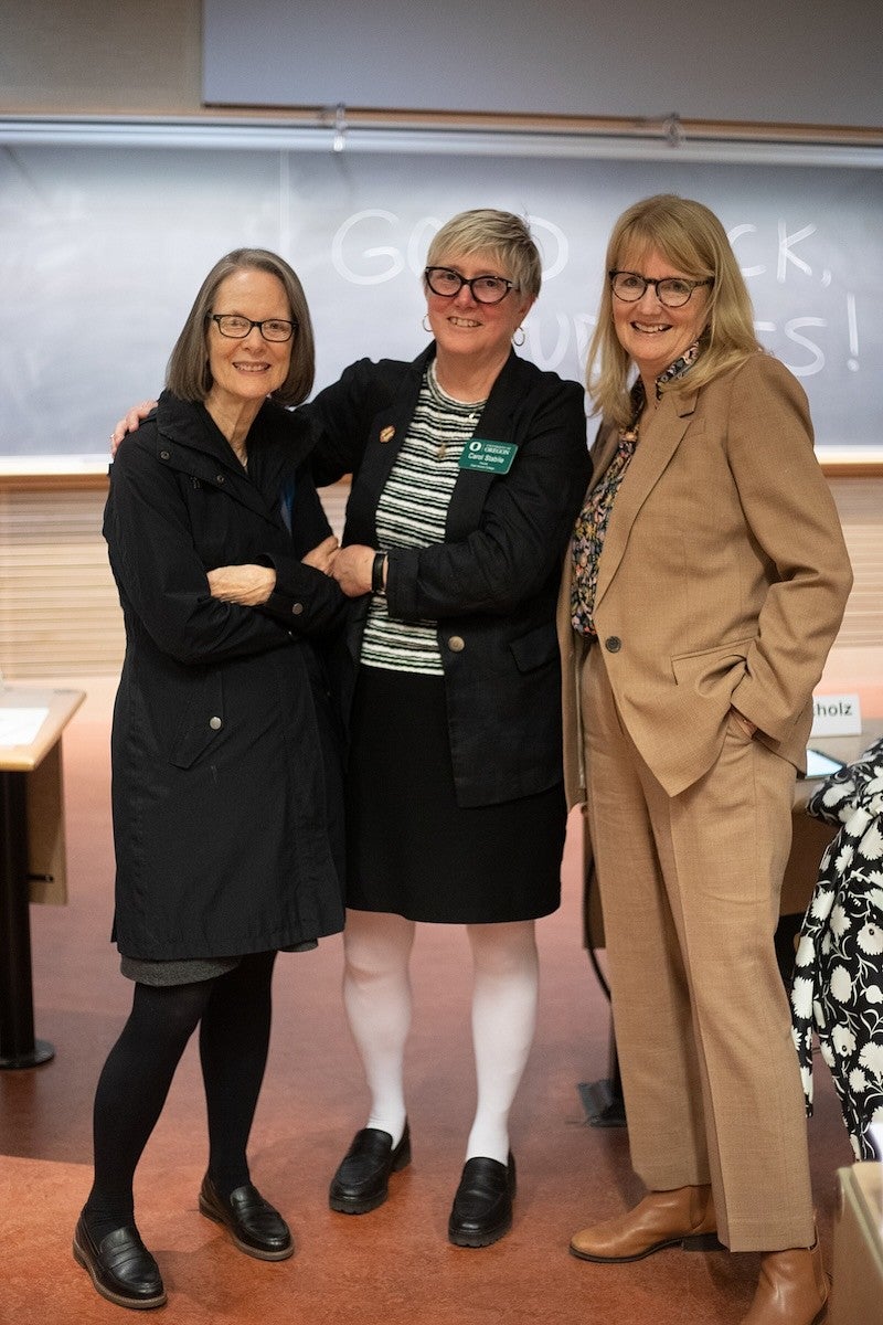 Karen Ford, Carol Stabile and Melissa Scholz pose at Three Minute Thesis