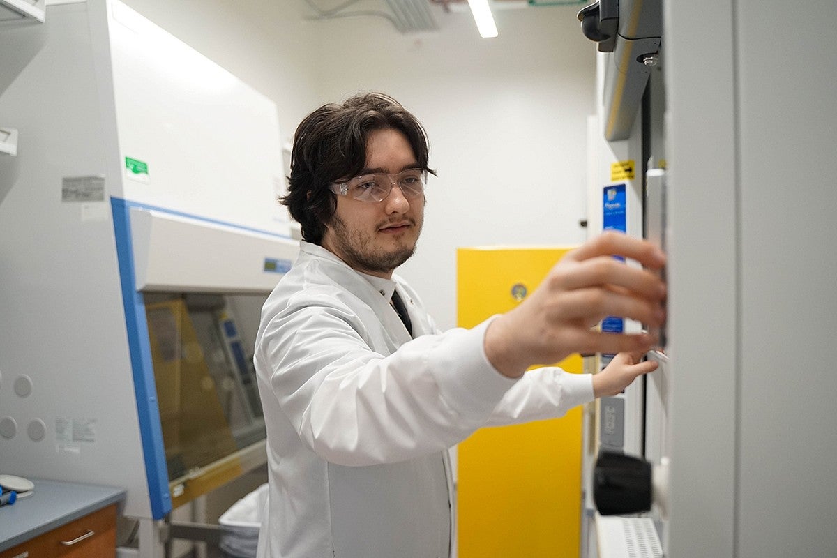 oliver loreto using lab equipment