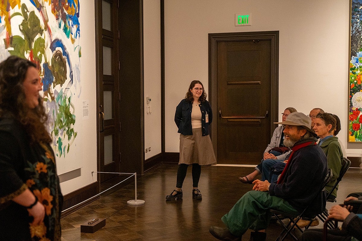 olivia black facilitating a discussion in a gallery of the Jordan Schnitzer Museum of Art