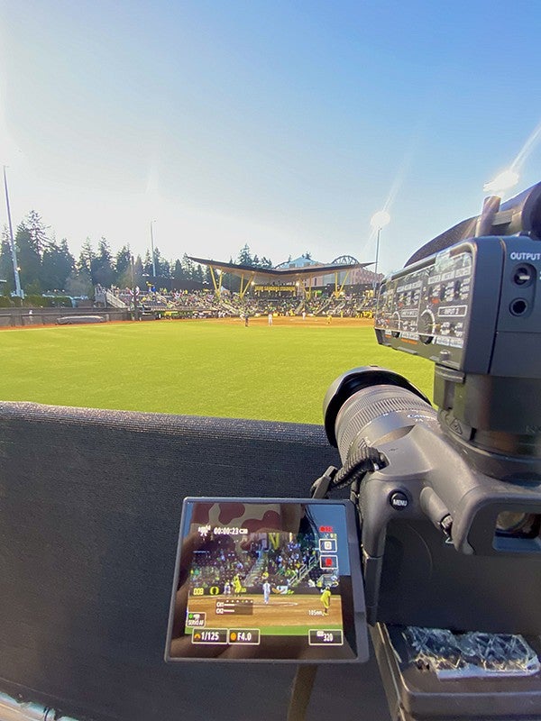 a video camera filming a baseball game