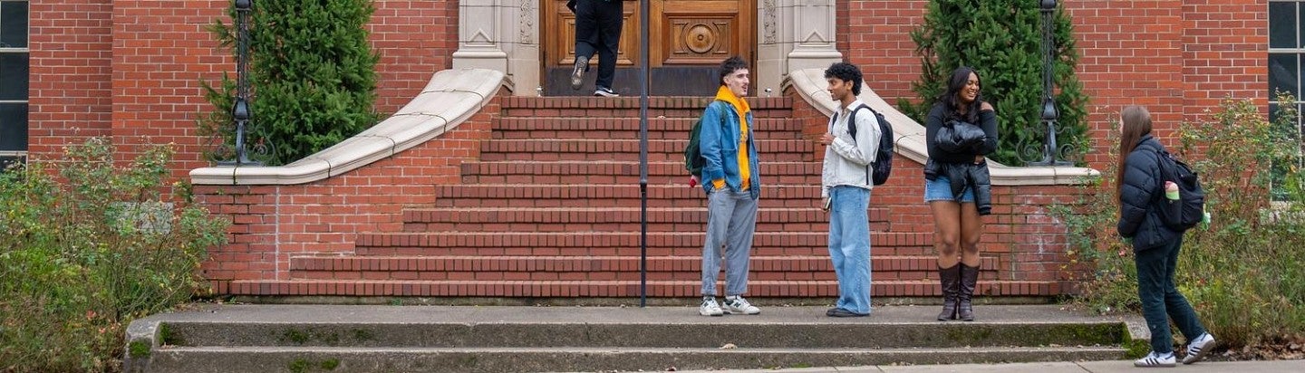 students on steps of chapman hall