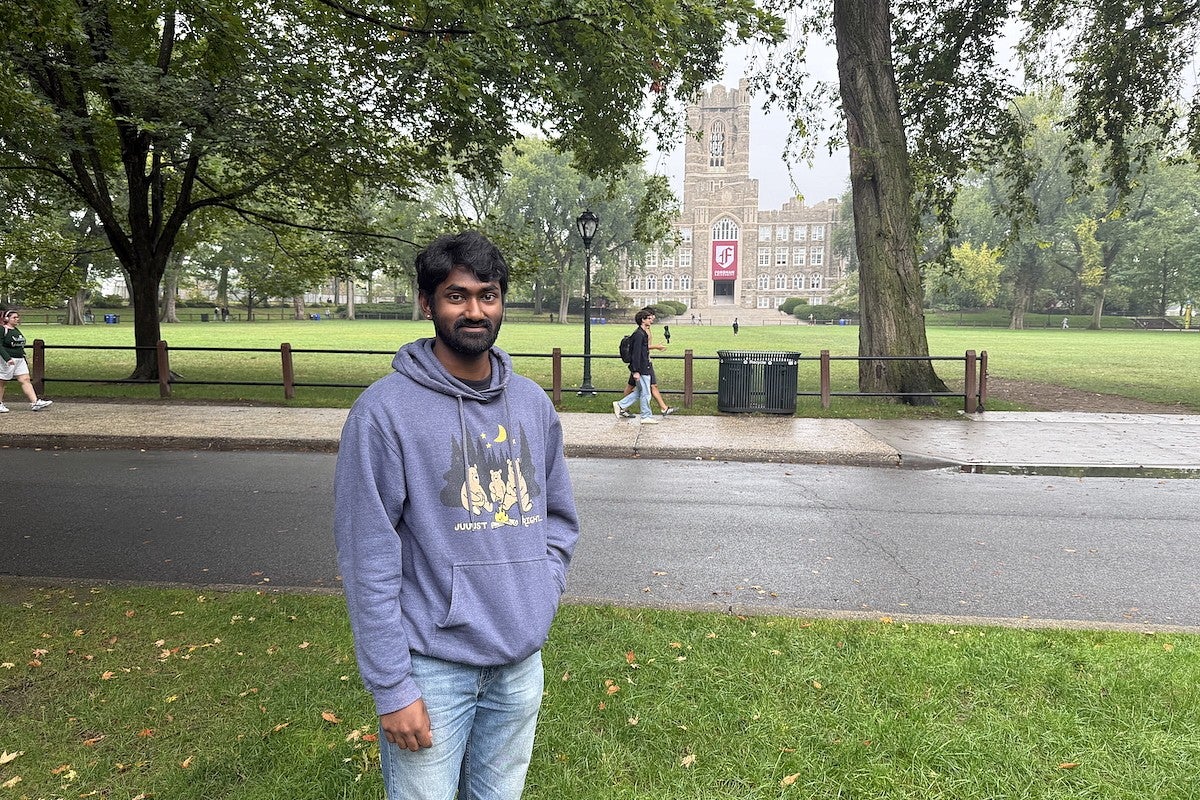 ashish sathya with fordham cathedral in background