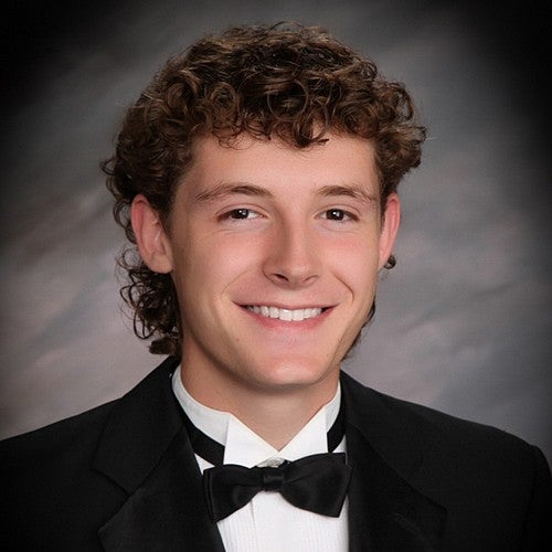 studio portrait of connor whitlach in tuxedo