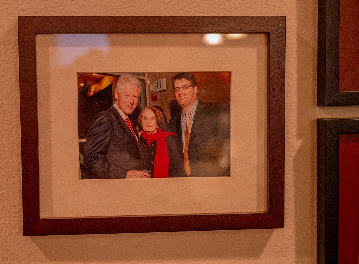 framed photo of fred poust with his mother joy and bill clinton