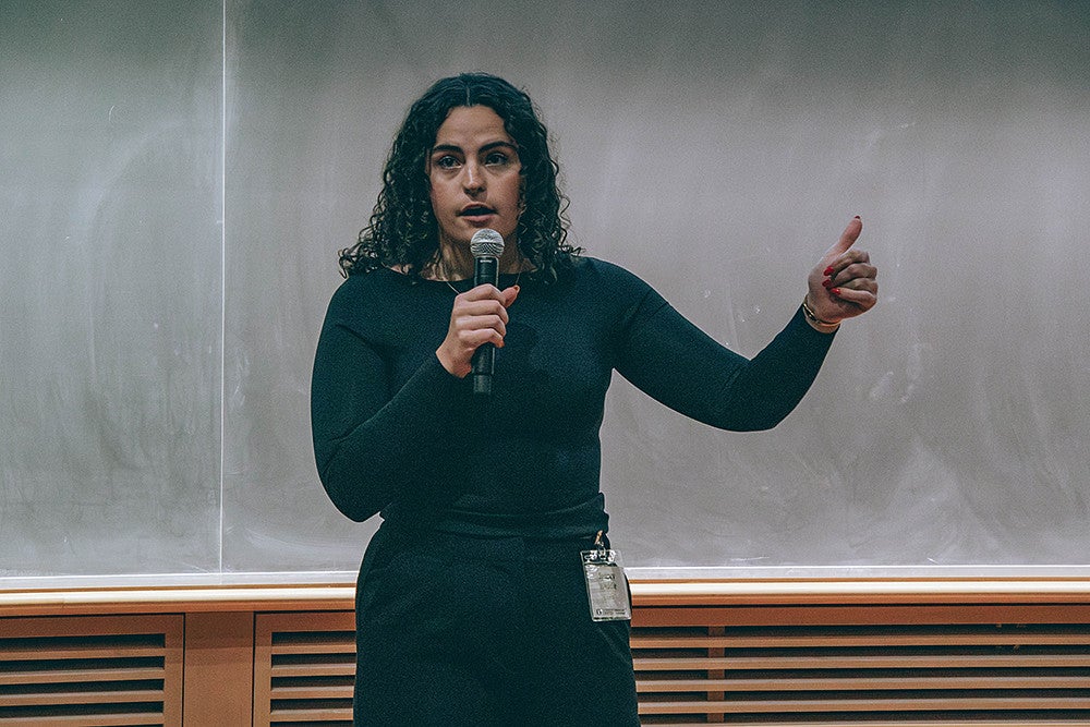sydney weddle presenting at three minute thesis competition