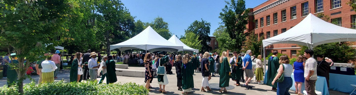 panorama of chc graduation celebration on mccaslin lawn