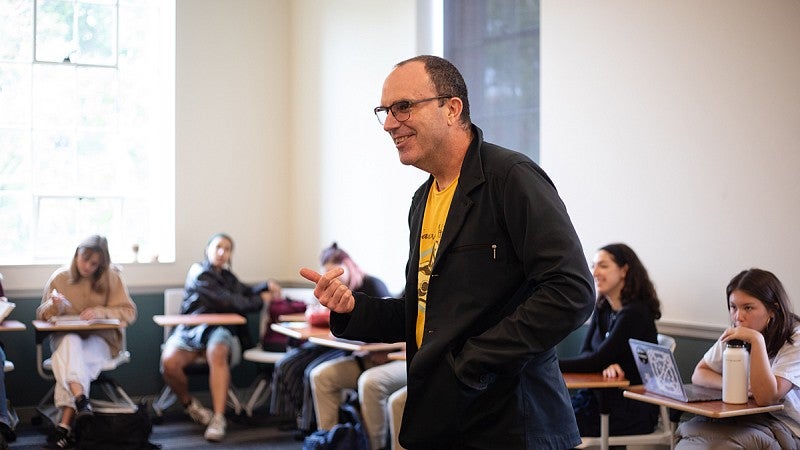 professor lecturing in small classroom