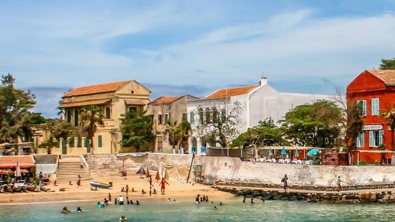 stock image of waterside city street in african country