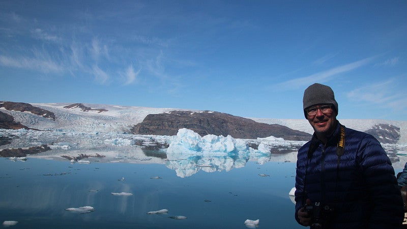 Mark Carey on a research trip to Greenland on a glacier