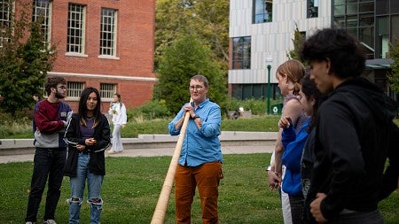 lydia van dreel teaching class on tykeson lawn with alpenhorn