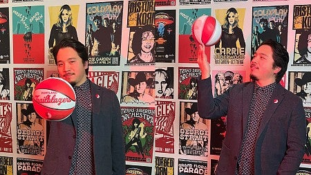 collage of two photos of ryan horiuchi standing in front of a concert poster wall, spinning a basketball and palming it towards the camera, with trailblazers pin on sport jacket