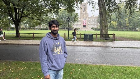 ashish sathya with fordham cathedral in background