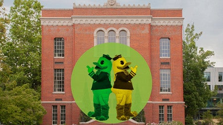 chapman hall with a graphic of the Duck as a mirror image, one yellow and one green