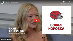 screenshot of a youtube thumbnail showing a student being interviewed in a classroom with a graphic of a ladybug and russian text superimposed next to her