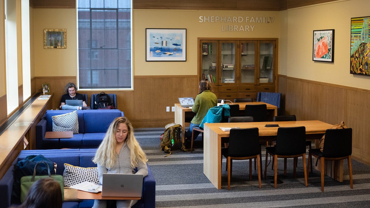 Students with laptops in the Shepherd Family Library