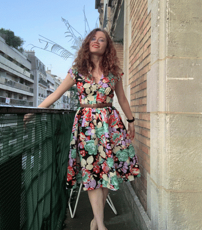 Hannah Steinkopf-Frank on a rooftop balcony