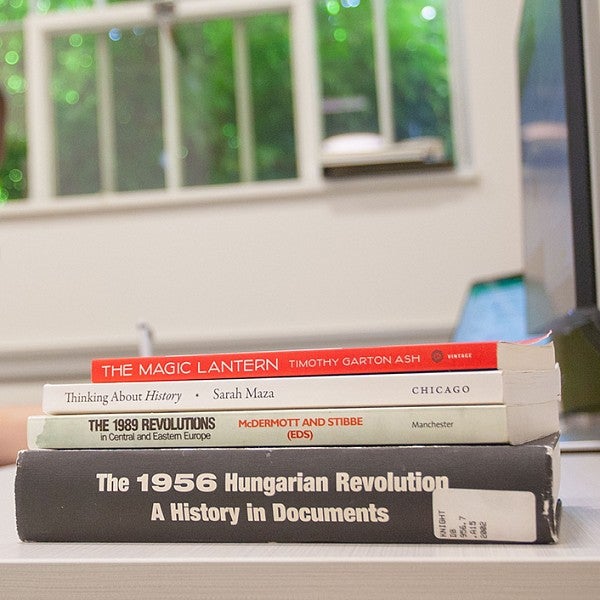 history books on the edge of Larissa Stiglich's desk