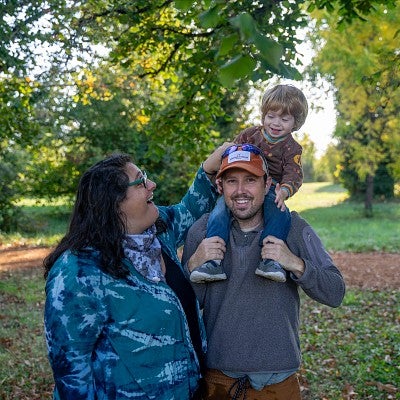 Jesse Wilson with wife and son