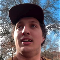 selfie of owen walking through campus