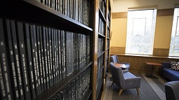 Bookshelf with theses. 