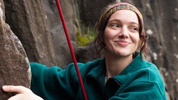 Ava Hearn climbing basalt columns.